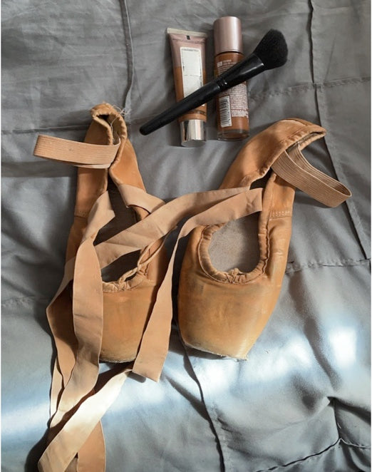 pancaking ballet shoes to match the dancer's skin-tone