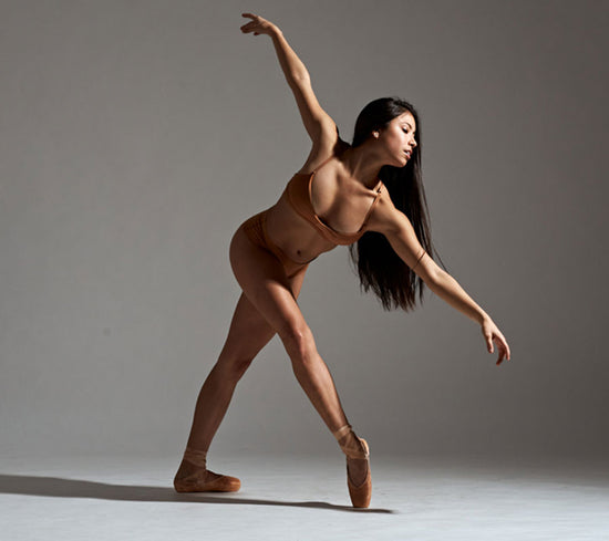 woman dancing in nude barre product